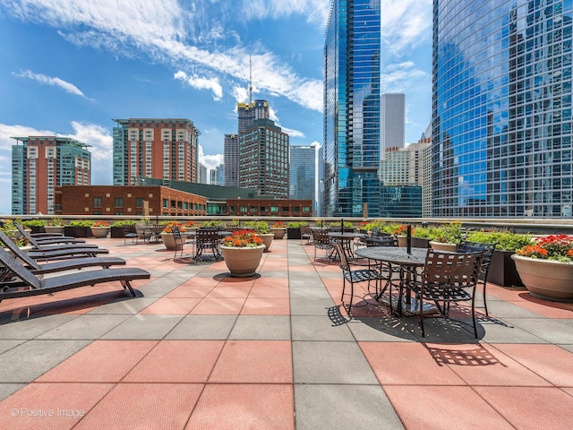 view of patio / terrace featuring a city view