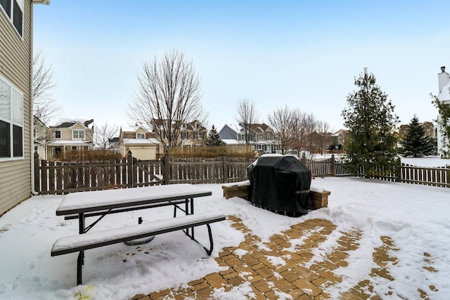 view of yard covered in snow