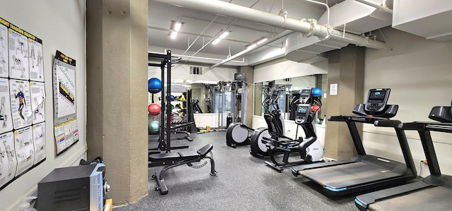 workout area featuring visible vents