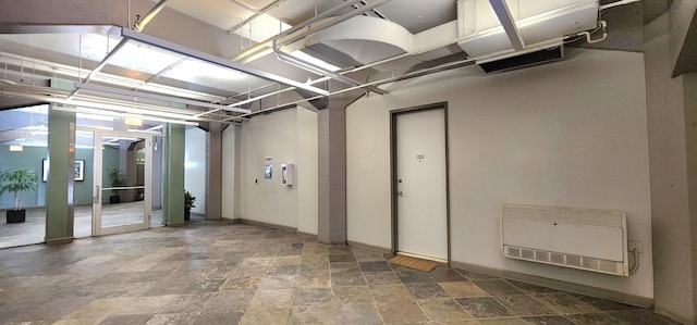 garage featuring baseboards