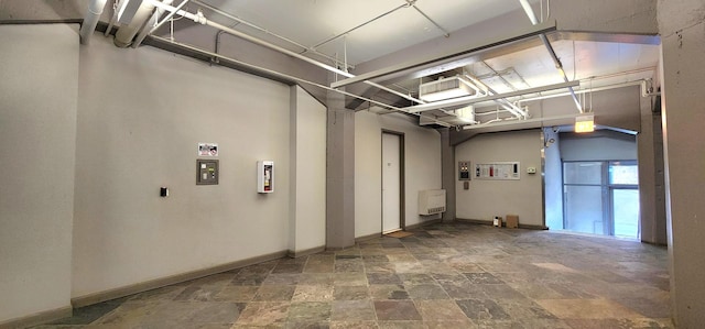 garage featuring baseboards