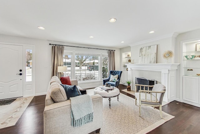 living room featuring baseboards, dark wood-style flooring, built in features, and recessed lighting