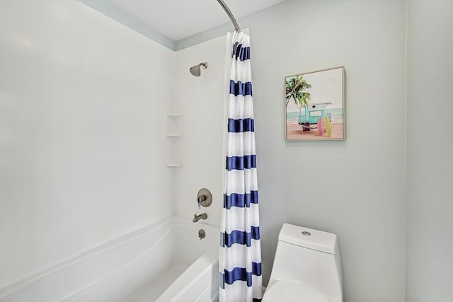 full bathroom with shower / tub combo with curtain and toilet