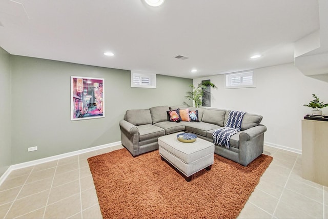 tiled living area with visible vents, baseboards, and recessed lighting