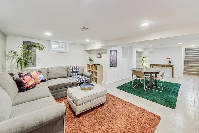 living area with stairway, light tile patterned flooring, visible vents, and recessed lighting