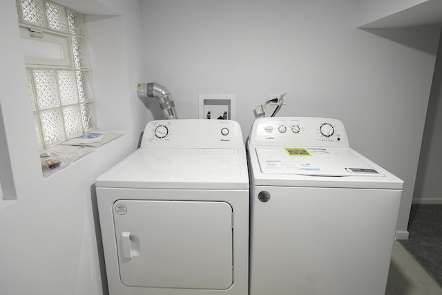 washroom with washer and clothes dryer