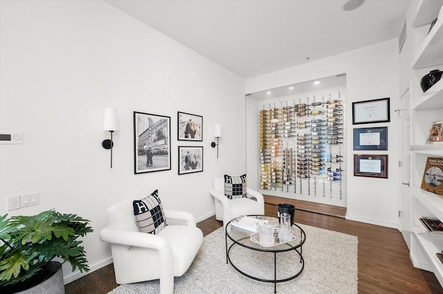 living area with dark hardwood / wood-style flooring