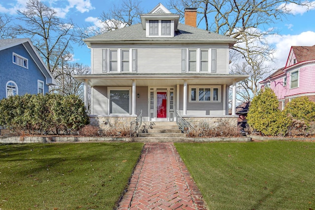 view of front of house with a front lawn