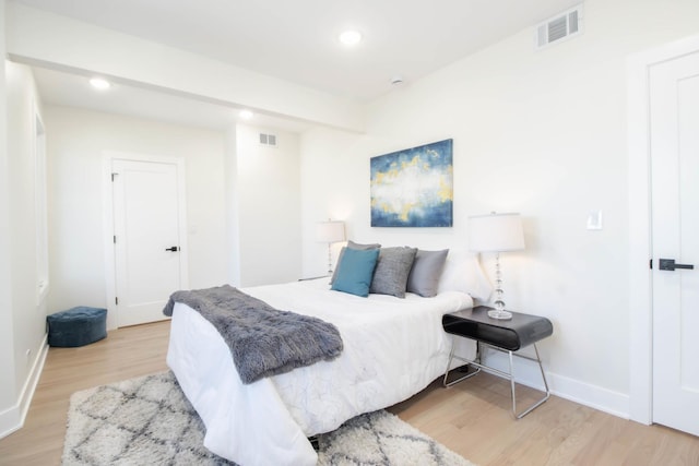 bedroom featuring light hardwood / wood-style flooring