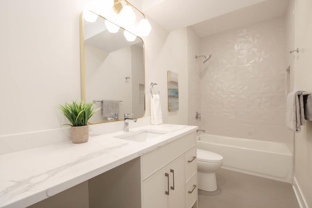 full bathroom with vanity, toilet, and tiled shower / bath