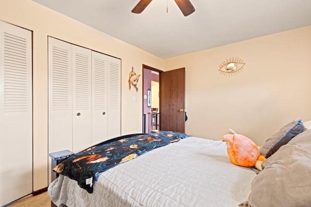 bedroom with ceiling fan and light colored carpet