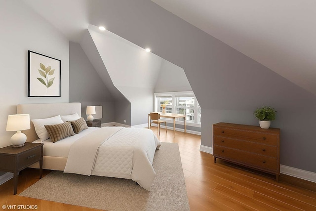 7121 S Yale Ave, Chicago, IL 60621 - bedroom with wood finished floors, vaulted ceiling, and recessed lighting