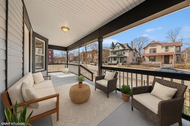 7121 S Yale Ave, Chicago, IL 60621 - covered porch featuring a residential view and outdoor lounge area