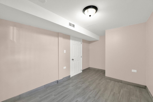 basement featuring light wood-type flooring