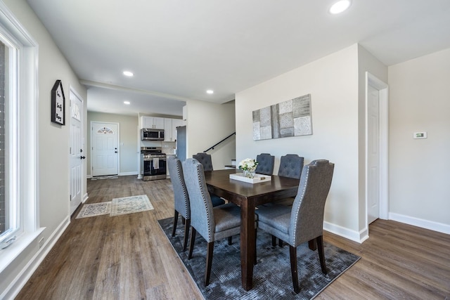 dining area featuring hardwood / wood-style flooring