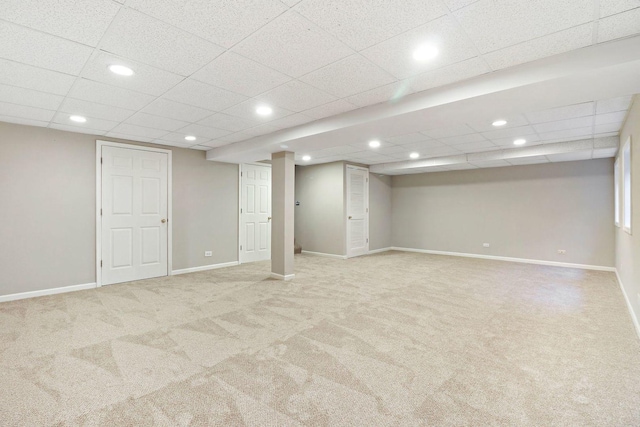 finished below grade area with recessed lighting, baseboards, and carpet floors