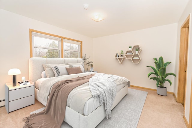 bedroom featuring light colored carpet