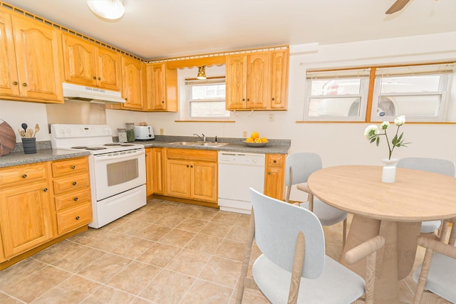 kitchen featuring sink, white appliances, light tile patterned floors, and ceiling fan