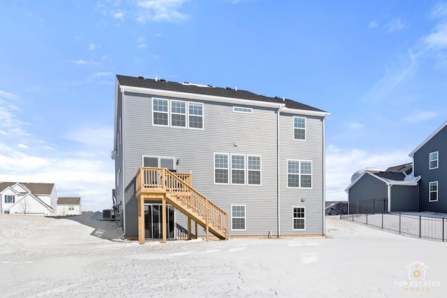 rear view of property featuring central air condition unit