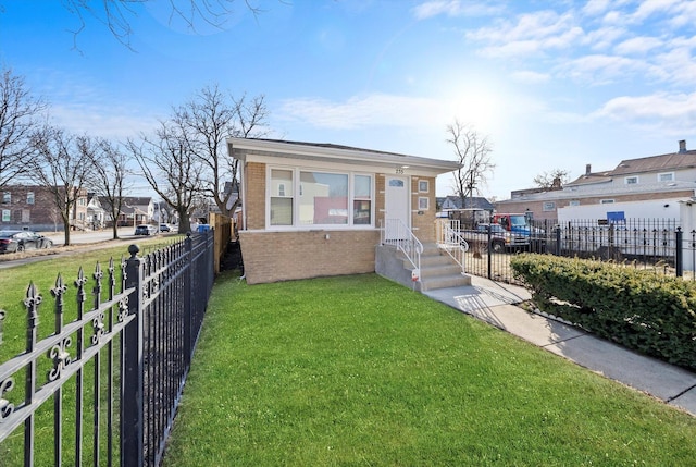 view of front of home with a front lawn