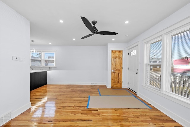 interior space featuring ceiling fan and light hardwood / wood-style flooring