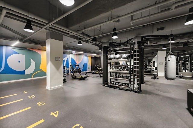 gym featuring visible vents and baseboards