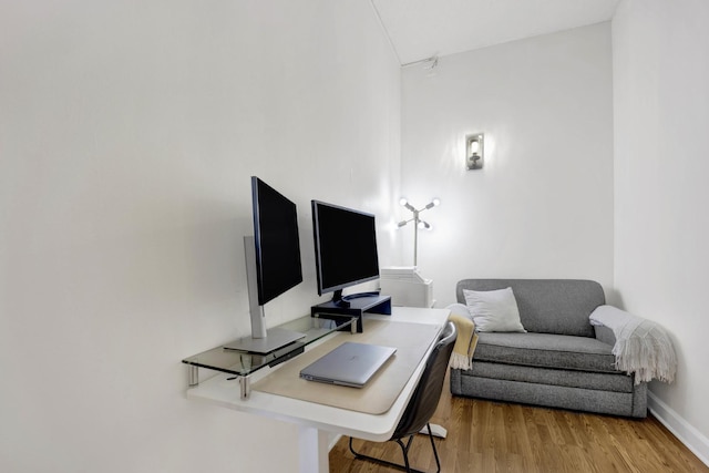 office space with light hardwood / wood-style flooring