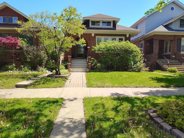 936 N Ridgeland Ave, Oak Park, IL 60302 - view of front of home with a front yard and brick siding