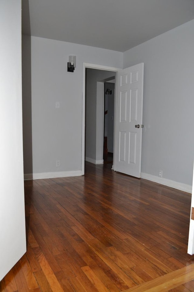 936 N Ridgeland Ave, Oak Park, IL 60302 - empty room with hardwood / wood-style floors and baseboards