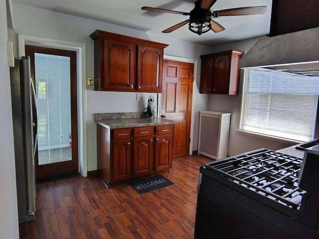 936 N Ridgeland Ave, Oak Park, IL 60302 - kitchen featuring freestanding refrigerator, dark wood finished floors, ceiling fan, and radiator