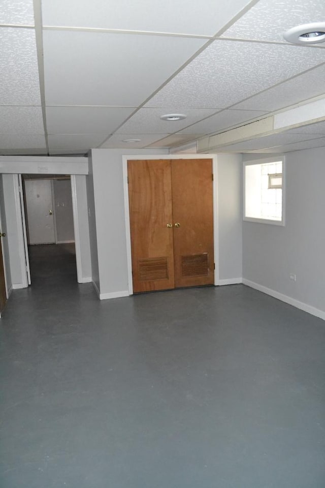 936 N Ridgeland Ave, Oak Park, IL 60302 - below grade area featuring a drop ceiling and baseboards