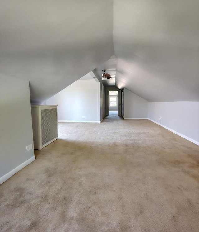 936 N Ridgeland Ave, Oak Park, IL 60302 - additional living space with lofted ceiling, ceiling fan, baseboards, and carpet floors