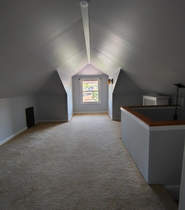 936 N Ridgeland Ave, Oak Park, IL 60302 - bonus room with vaulted ceiling, light carpet, and baseboards