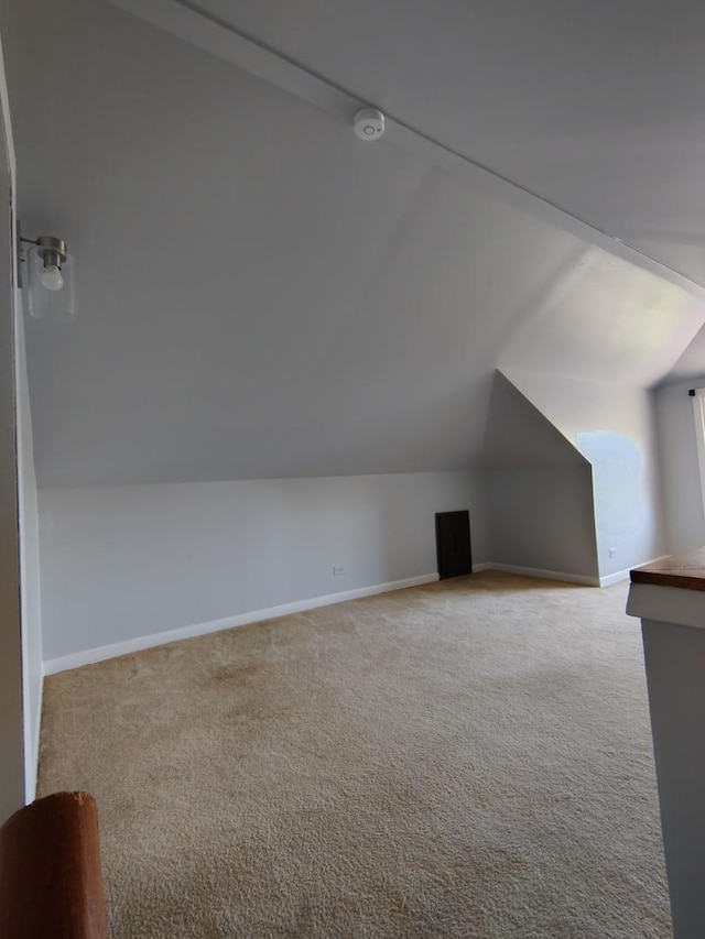 936 N Ridgeland Ave, Oak Park, IL 60302 - bonus room with vaulted ceiling, carpet, and baseboards