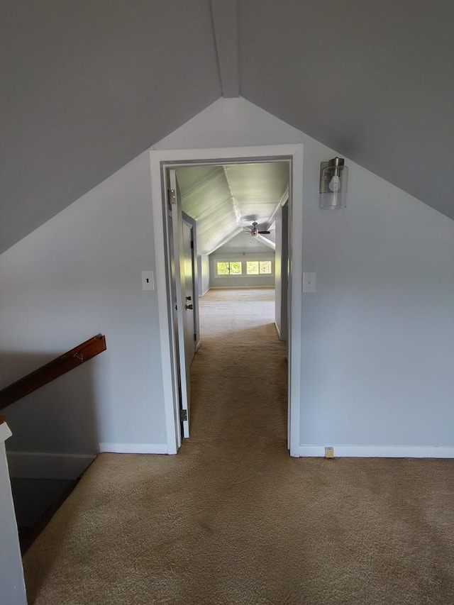 936 N Ridgeland Ave, Oak Park, IL 60302 - hall featuring vaulted ceiling, carpet, baseboards, and an upstairs landing