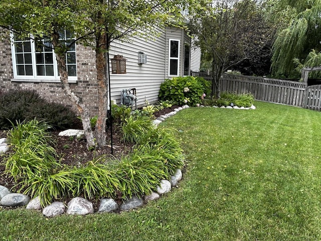 view of yard with fence