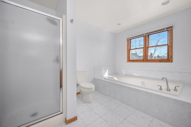 full bath with a bath, a stall shower, tile patterned flooring, and toilet