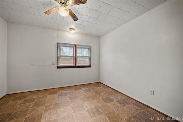 unfurnished room with ceiling fan