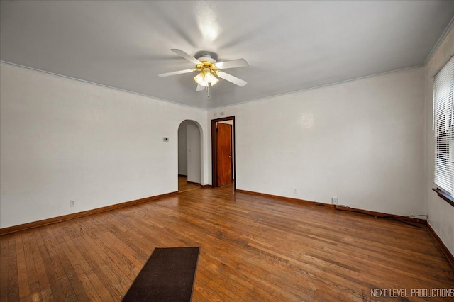 unfurnished room with wood-type flooring and ceiling fan