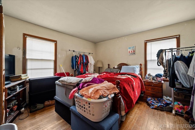 bedroom featuring light wood-type flooring