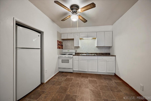 kitchen featuring sink, ceiling fan, white cabinets, white appliances, and backsplash