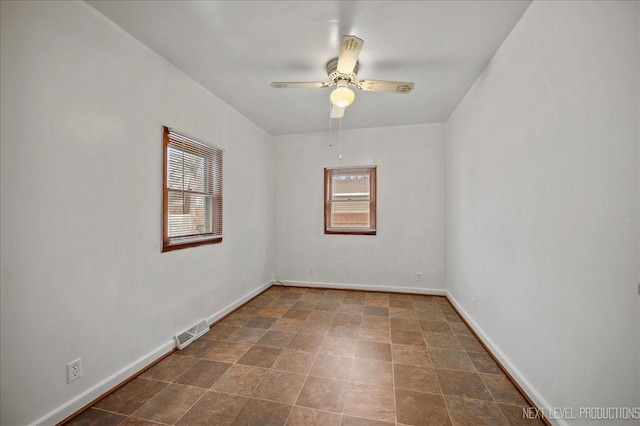 unfurnished room featuring ceiling fan