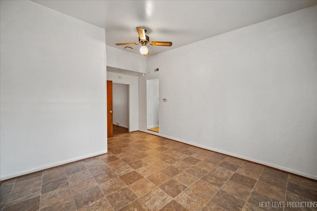 unfurnished room featuring ceiling fan