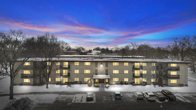 view of property at dusk