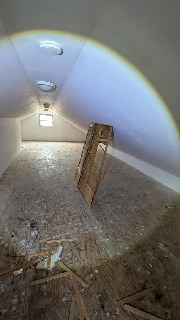 bonus room with vaulted ceiling