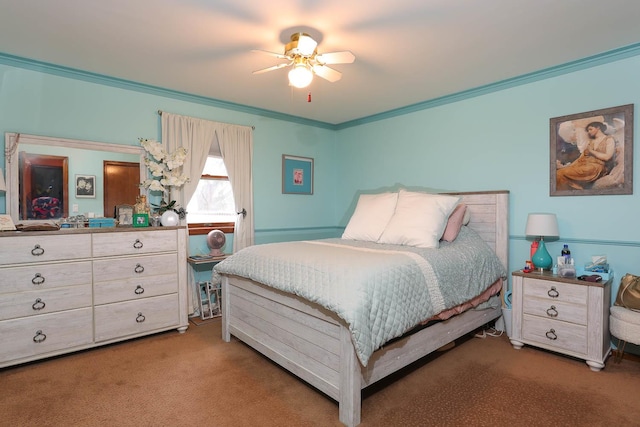 bedroom with crown molding, ceiling fan, and carpet