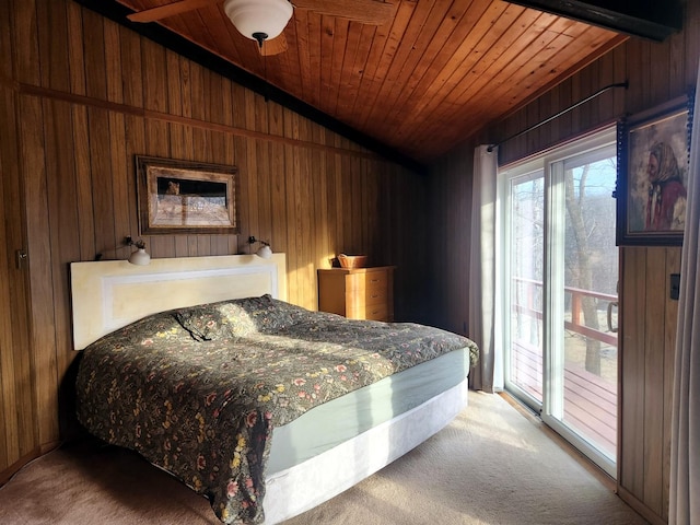 carpeted bedroom with access to exterior, wood ceiling, vaulted ceiling, and wooden walls