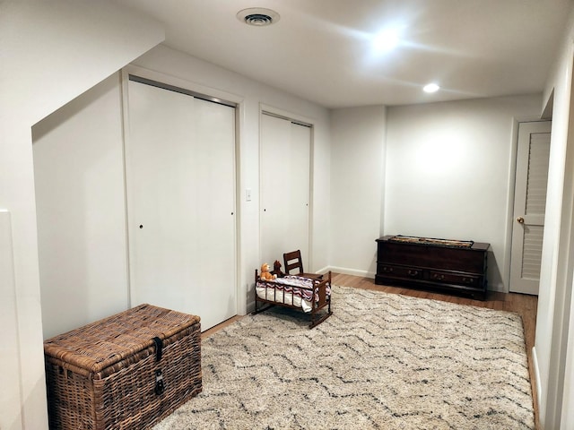 sitting room with hardwood / wood-style floors