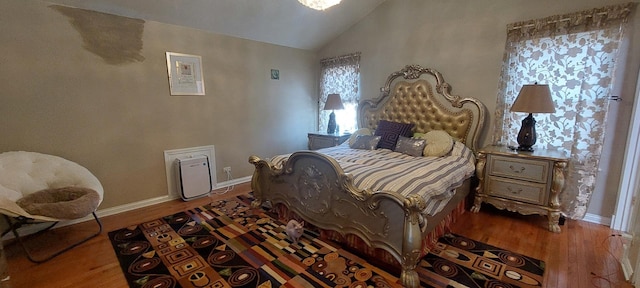256 Homewood Dr, Bolingbrook, IL 60440 - bedroom with vaulted ceiling and wood-type flooring