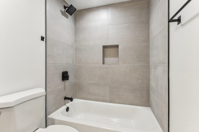 bathroom with shower / bathtub combination and toilet